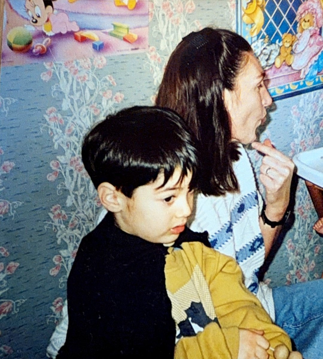 Michael as a young boy with founder Noreen at The Cornerhouse in the 1980s