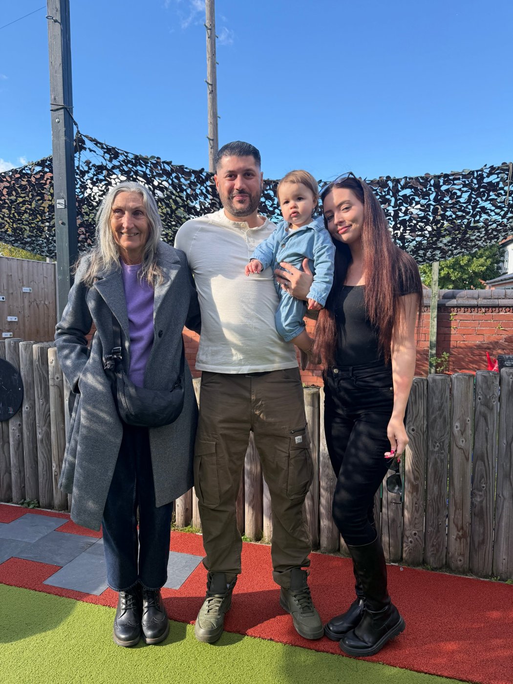 Noreen with Michael, Isabella and Chantel in the garden at The Cornerhouse